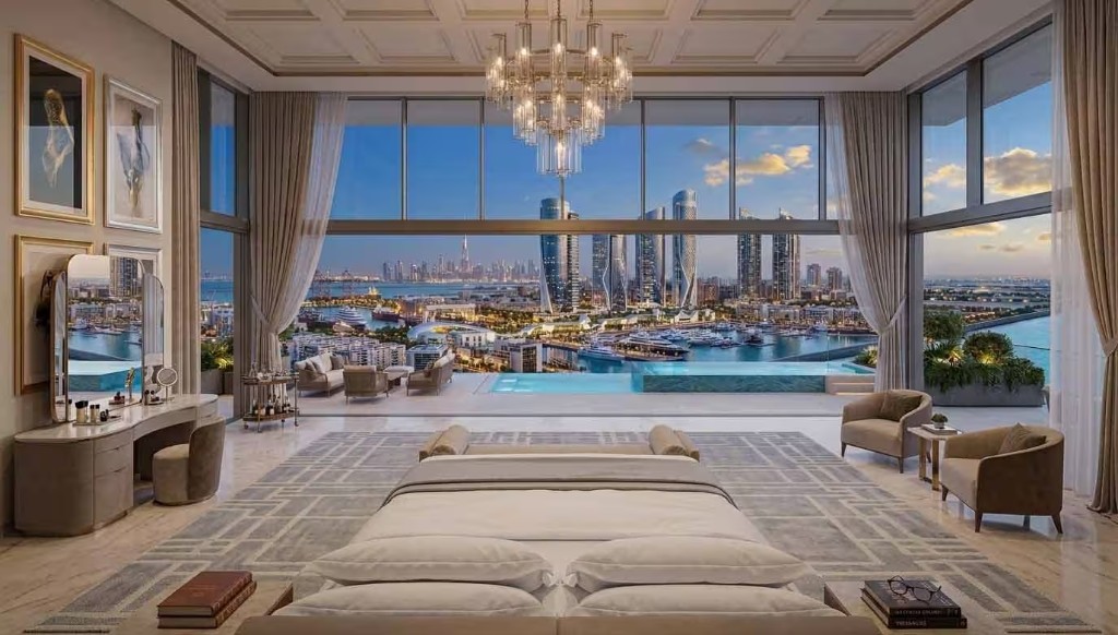 Bedroom looking toward a marina skyline